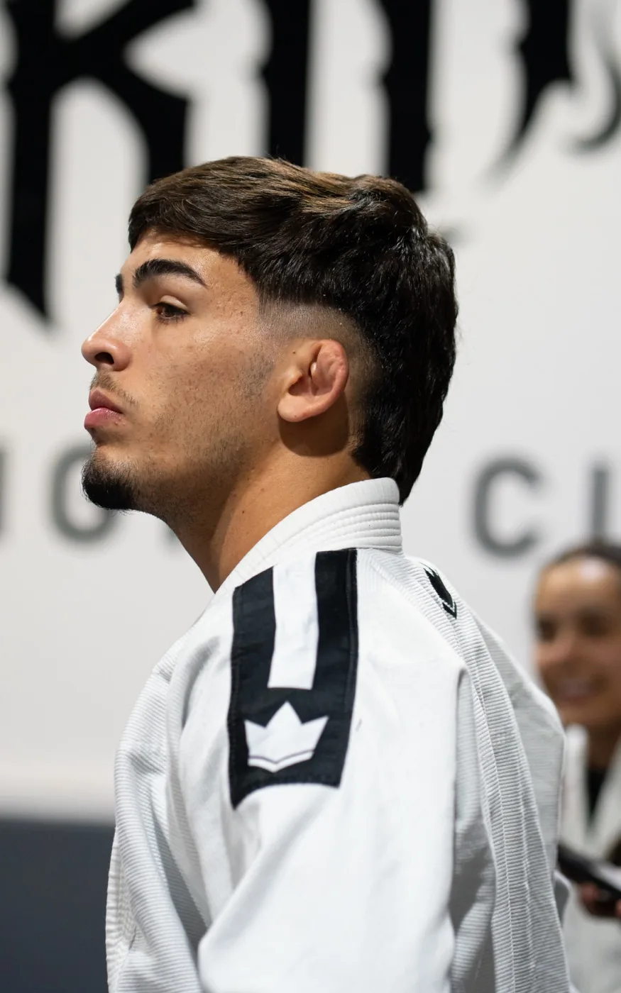 A Brazilian Jiu-Jitsu student focused before training