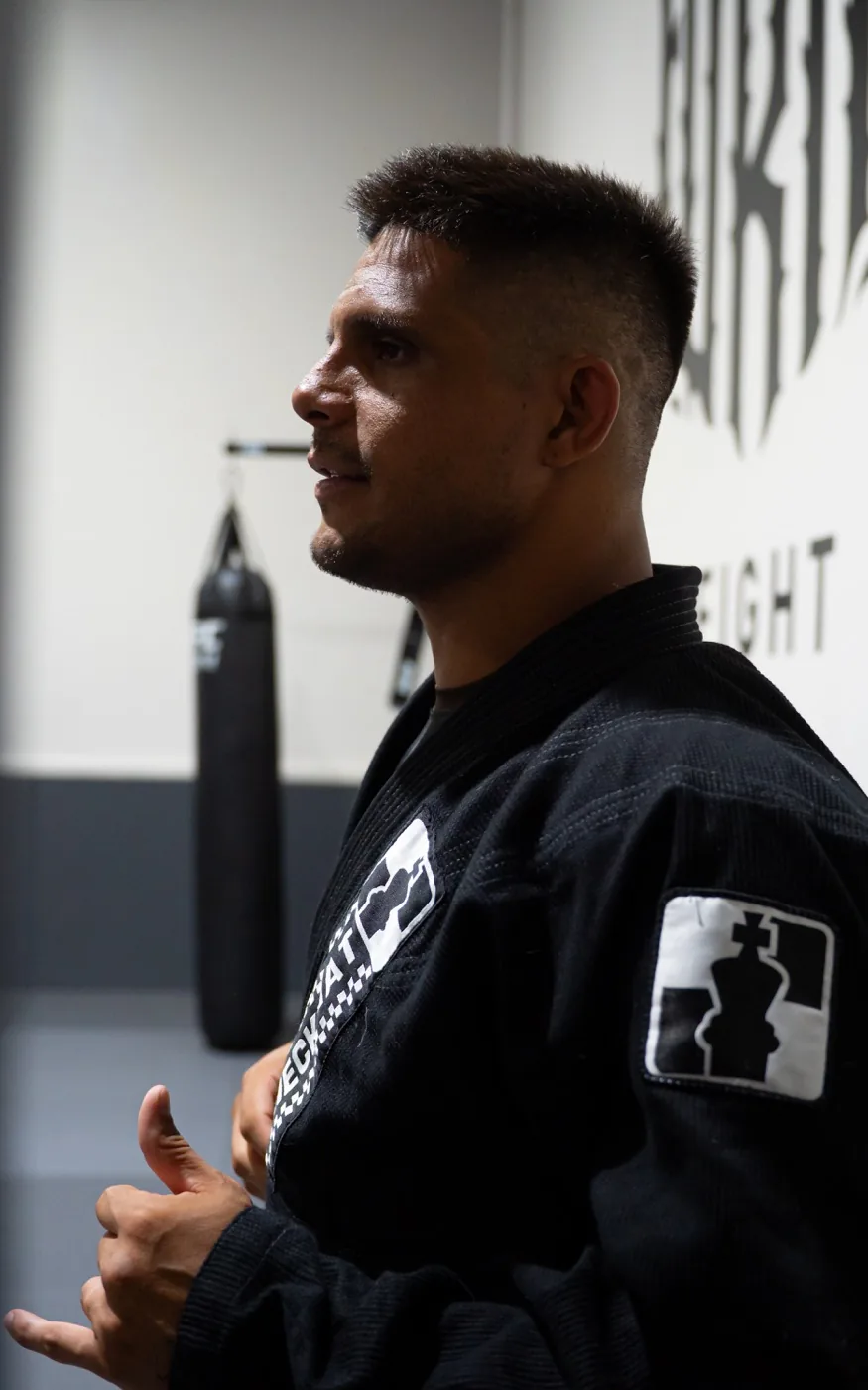 A Fúria Fight Club Brazilian Jiu-Jitsu coach in a black gi
